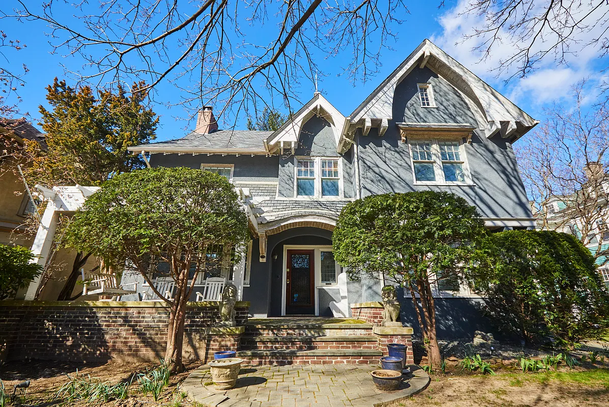 brooklyn open houses - exterior of a standalone house with shrubbery, a brick porch
