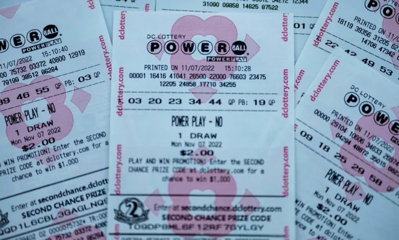 WASHINGTON, DC - NOVEMBER 07: In this photo illustration, tickets for the upcoming Powerball lottery are seen on November 07, 2022 in Washington, DC. The estimated Powerball jackpot for the November 7th drawing has increased to $1.9 billion, with an estimated lump sum payment of $929.1 million. (Photo illustration by Tasos Katopodis/Getty Images)