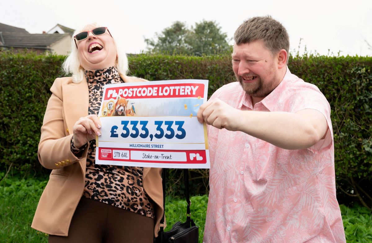 Lee Plant celebrates his postcode lottery prize with his mum Wendy