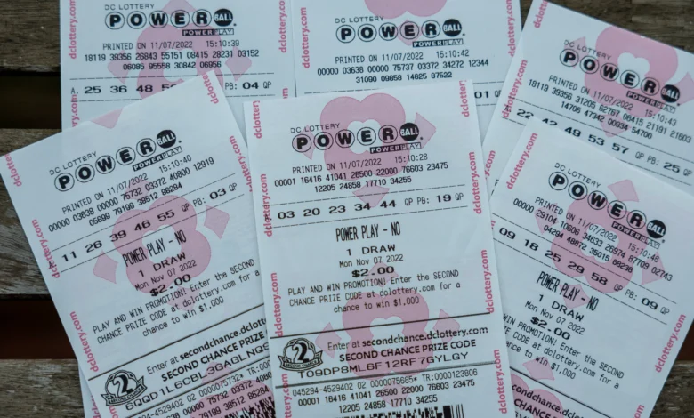 WASHINGTON, DC - NOVEMBER 07: In this photo illustration, tickets for the upcoming Powerball lottery are seen on November 07, 2022 in Washington, DC. The estimated Powerball jackpot for the November 7th drawing has increased to $1.9 billion, with an estimated lump sum payment of $929.1 million. (Photo illustration by Tasos Katopodis/Getty Images)