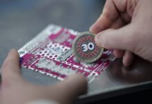 National Lottery retailers receive exclusive Scratch-Coins to mark 30 years