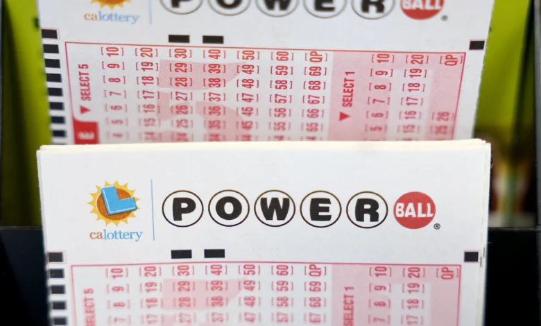 LOS ANGELES, CALIFORNIA - JULY 18: Powerball play slips are displayed in a convenience store on July 18, 2023 in Los Angeles, California. The Powerball jackpot for the drawing on July 19th is now estimated to be $1 billion after three months of drawings without a winner. (Photo by Mario Tama/Getty Images)