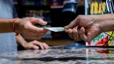AUSTIN, TEXAS - OCTOBER 10: A customer purchases a Powerball lottery ticket at the Brew Market &amp; Cafe on October 10, 2023 in Austin, Texas. The Powerball jackpot has grown to over $1.7 billion, making it the second largest jackpot in history. (Photo by Brandon Bell/Getty Images)