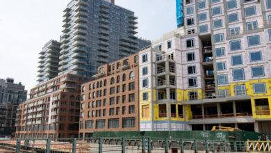 housing - buildings with brick lower levels