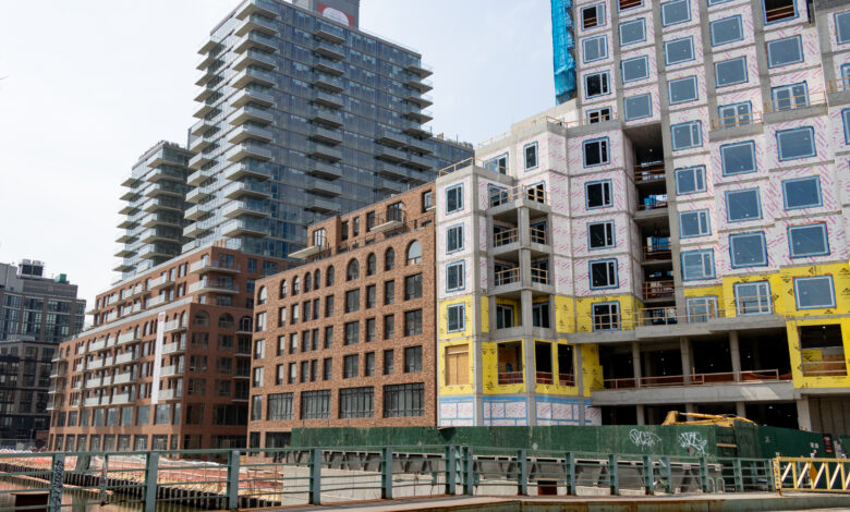 housing - buildings with brick lower levels
