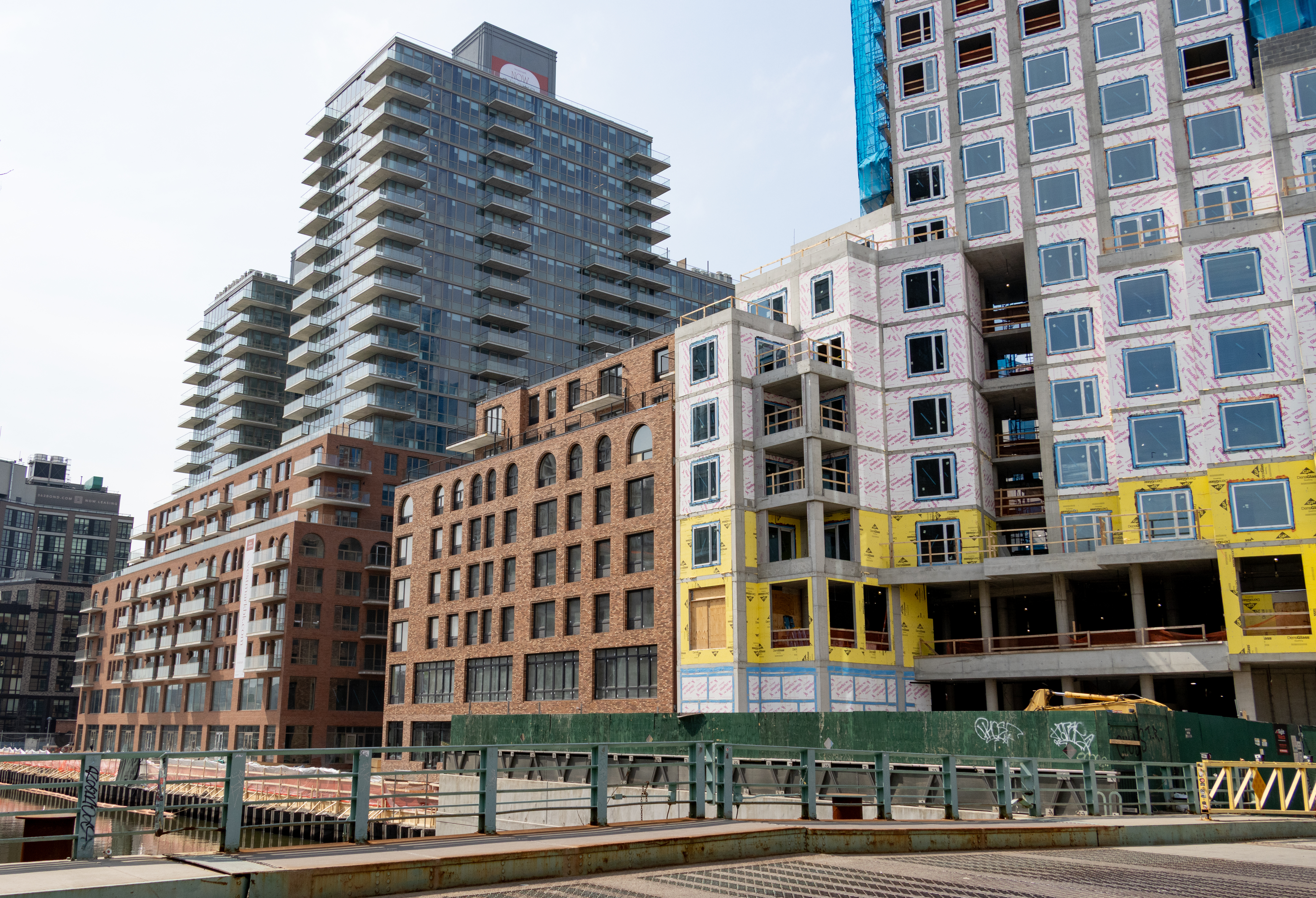 housing - buildings with brick lower levels