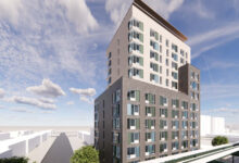 brownsville - rendering of a multi-story building with a gray brick base