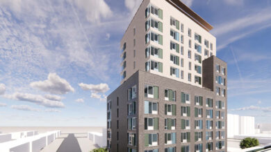 brownsville - rendering of a multi-story building with a gray brick base