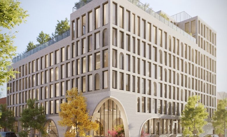 pale building with arched and curved entrances