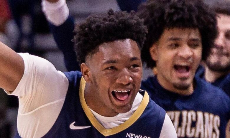 Dec 8, 2025; New Orleans, Louisiana, USA;  New Orleans Pelicans center Derik Queen (22) reacts to a play against the San Antonio Spurs during the second half at Smoothie King Center. Mandatory Credit: Stephen Lew-Imagn Images