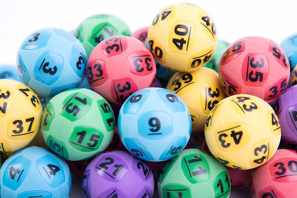 A number of coloured lotto balls.