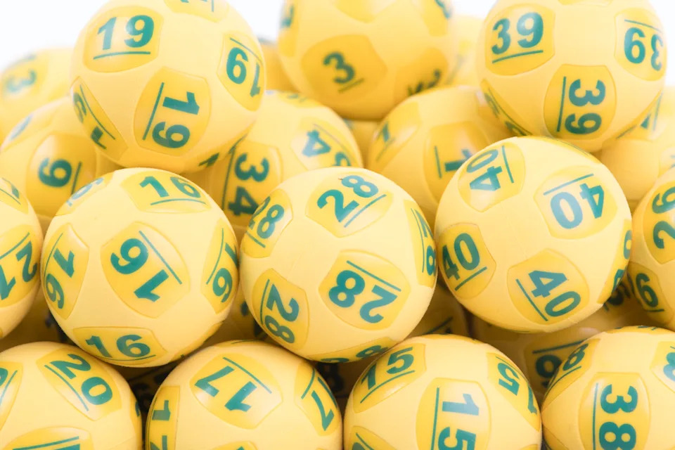 A pile of yellow Oz Lotto balls as the latest draw jackpots $70 million.