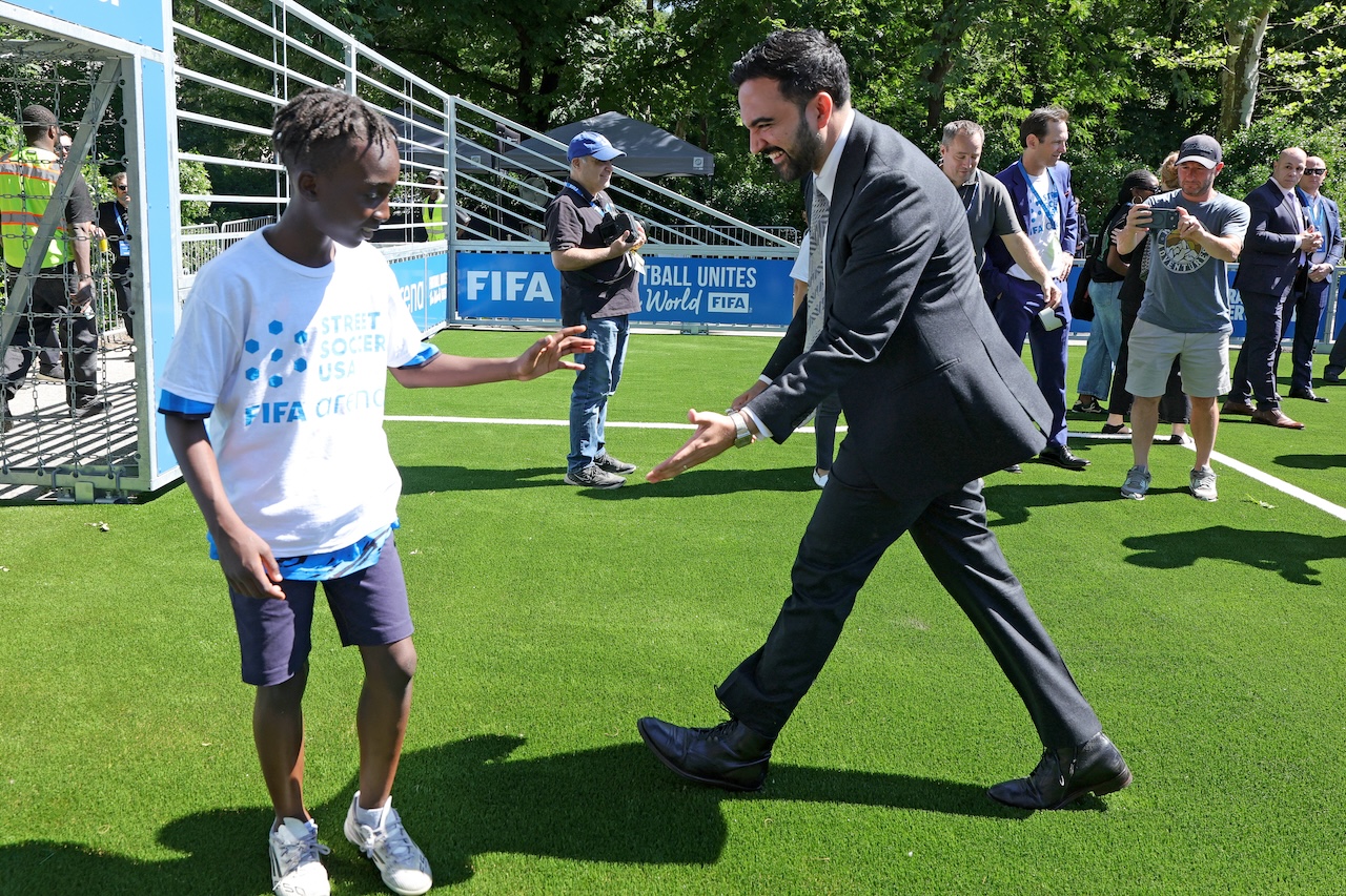New York City Mayor Zohran K. Mamdani high-fives a young footballer during the launch of FIFA Arena in Central Park, part of New York City's celebrations surrounding the FIFA World Cup 2026™. Image: Getty