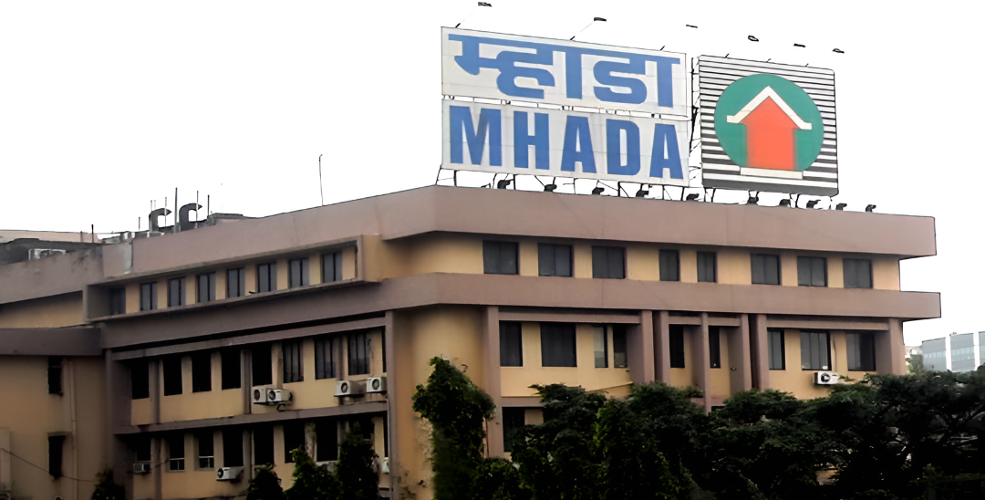 

<p>At the heart of MHADA’s near-term strategy is the construction of close to 19,500 housing units across Maharashtra in FY26, as outlined in its recently approved annual budget.</p>
<p>“/><figcaption class=