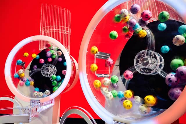 The two Lotto draw machines to mark the new two-round format giving players two chances to win with every £2 line