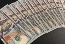 fourteen one hundred dollar bills