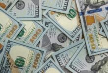 Pile of hundred dollar bills.
