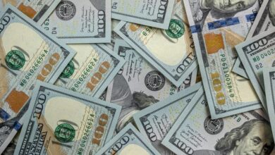 Pile of hundred dollar bills.