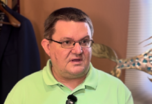 robert gawlitza in a light green polo shirt and glasses