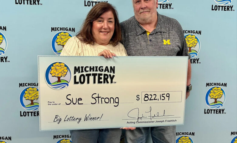 Michigan woman stops for pizza, wins record-setting lottery jackpot