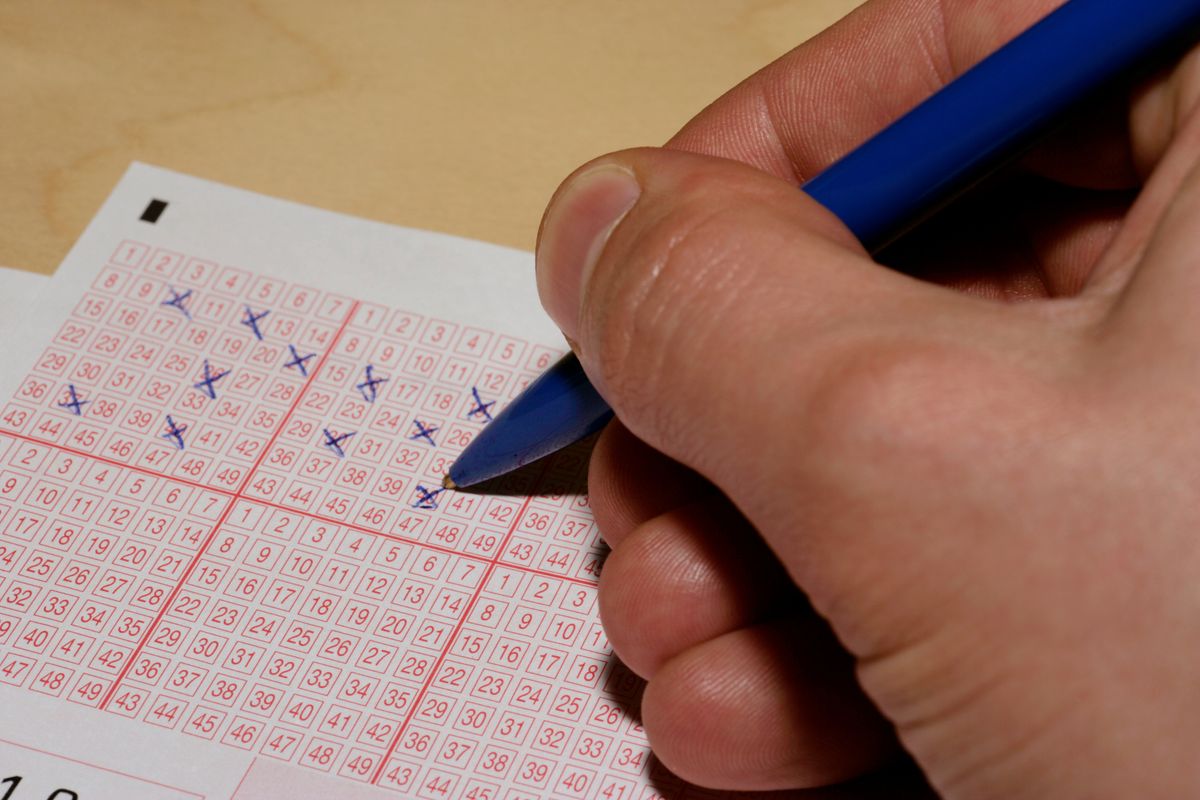 A-person-filling-out-a-lottery-ticket.jpg