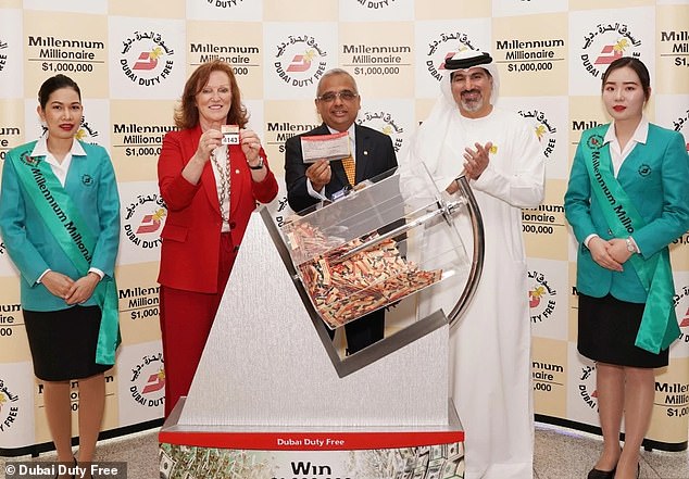 Officials drawing winning tickets at Dubai Duty Free's Millennium Millionaire booth at the airport on Tuesday
