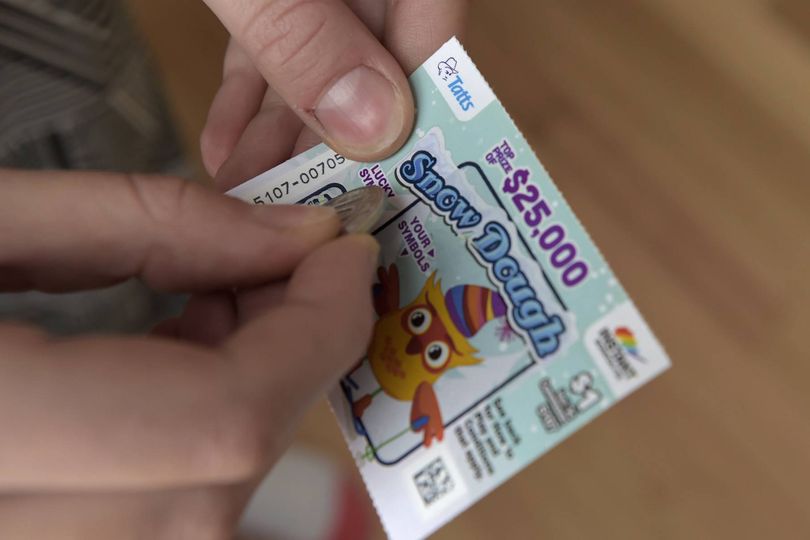 A Tatts Group Ltd. Instant Scratch-It scratchcard is arranged for a photograph at a newsagent's store in Melbourne, Australia, on Thursday, Dec. 15, 2016. A consortium including Morgan Stanley and KKR & Co. offered as much as A$7.3 billion ($5.5 billion) for Australian betting and lotteries business Tatts Group, setting up a potential bidding war with Tabcorp Holdings Ltd. Photographer: Carla Gottgens/Bloomberg via Getty Images