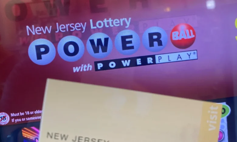 Powerball prize climbs to $1 billion after sales surge