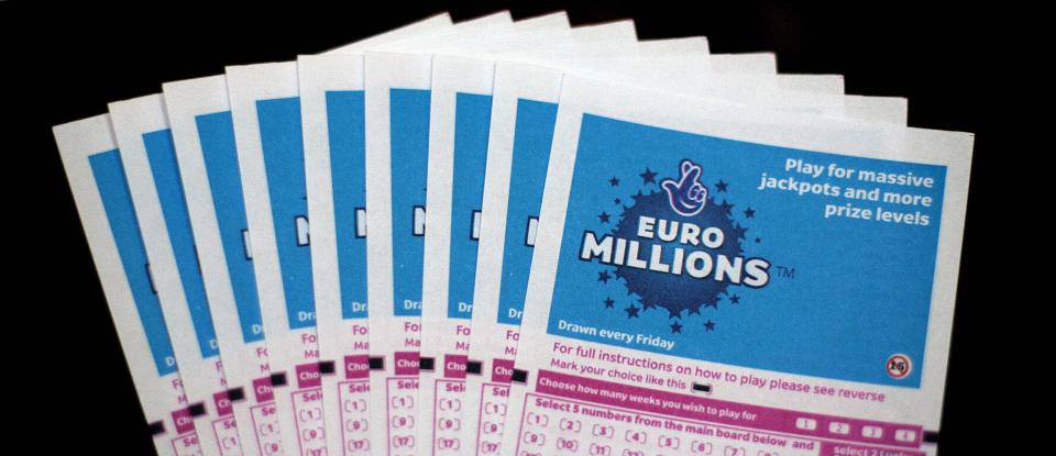 Multiple EuroMillions lottery tickets fanned out.