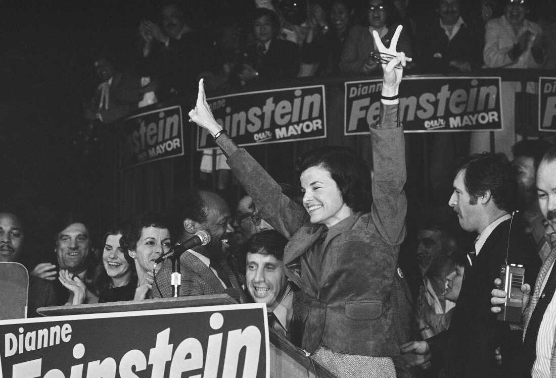 Dianne Feinstein, named mayor following the assassination of late Mayor George Moscone, in San Francisco on Dec. 12, 1979. With her on the victory platform are, from left, Moscone's widow, Gina Moscone, Assemblyman Willie Brown and Feinstein's fiancé, Richard Blum. Feinstein, who was the first woman to serve as mayor of San Francisco, went on to become the longest-serving member of the U.S. Senate.