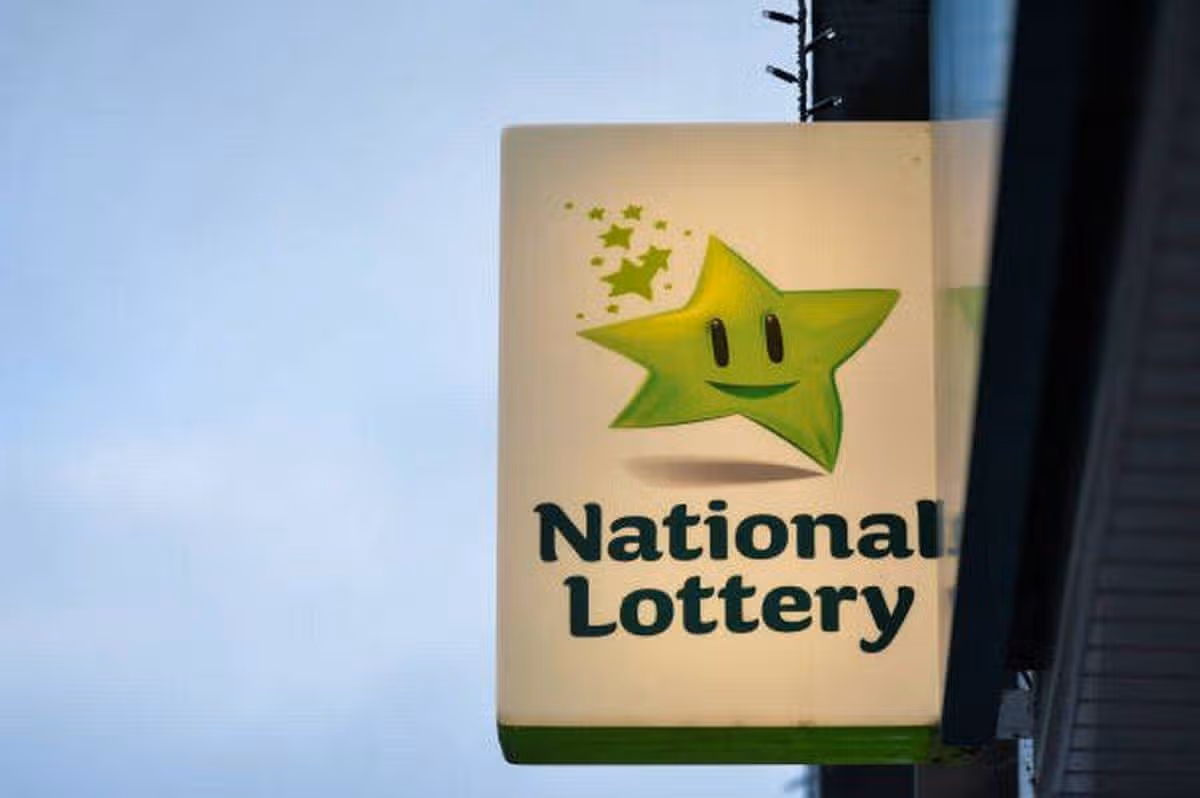 A signboard with a green star and the text 