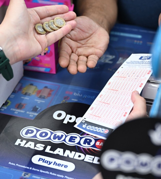 EDITORIAL USE ONLY A Powerball ticket and logo are revealed in Watford as The National Lottery unveils Powerball ahead of tickets becoming available from 21 July, subject to final regulatory approval. Issue date: Monday July 6, 2026. PA Photo. Powerball will offer UK players the chance to play for jackpots starting at ?12 million and capable of growing into the hundreds of millions. Photo credit should read: Doug Peters/PA Media Assignments